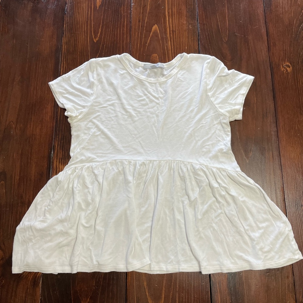 Short sleeve flowy top with umpire waist